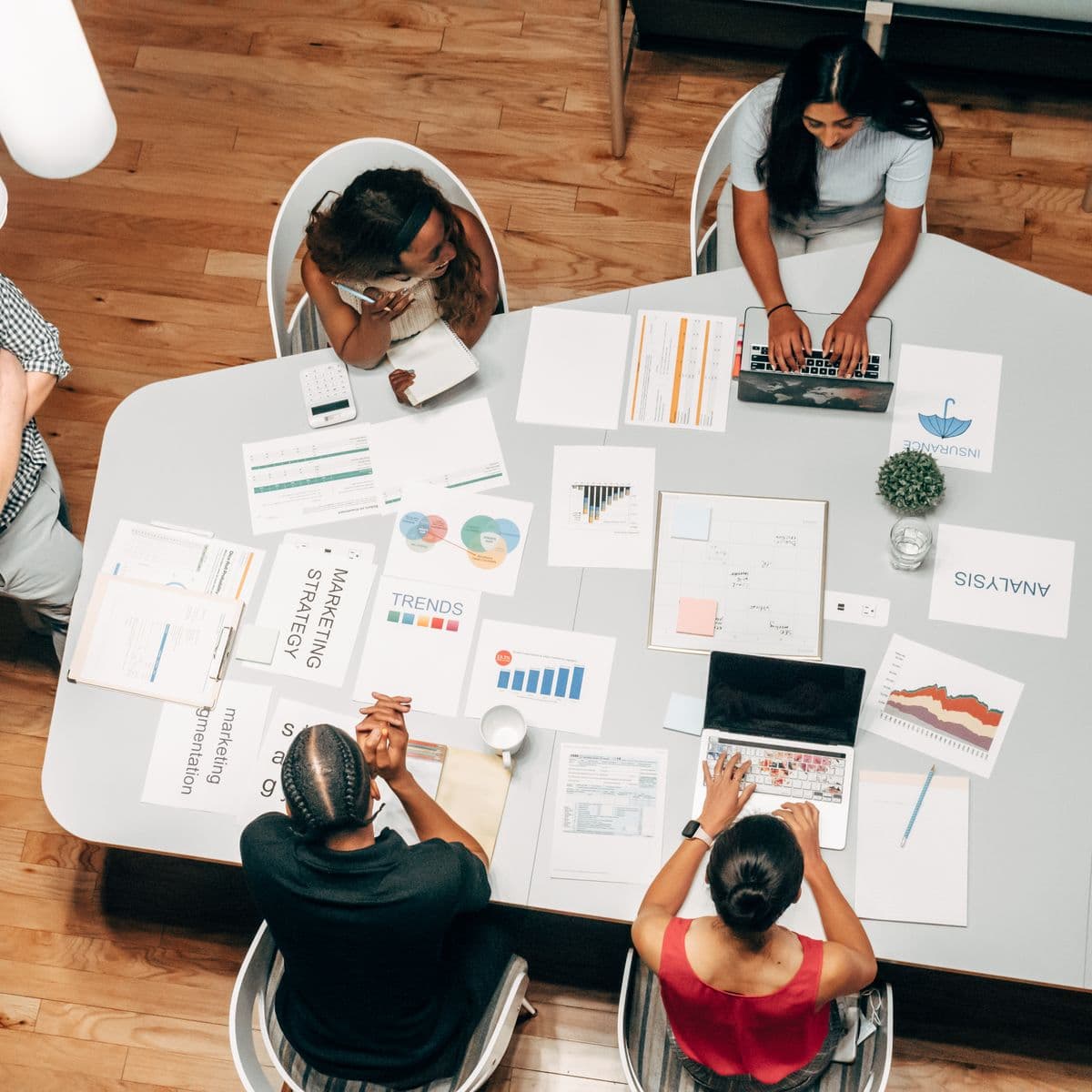 Content creator planning editorial assets on a desk